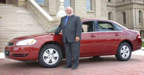 Images from 
Sen. Kahn Drives His Ethanol-Powered Car to Senate Session